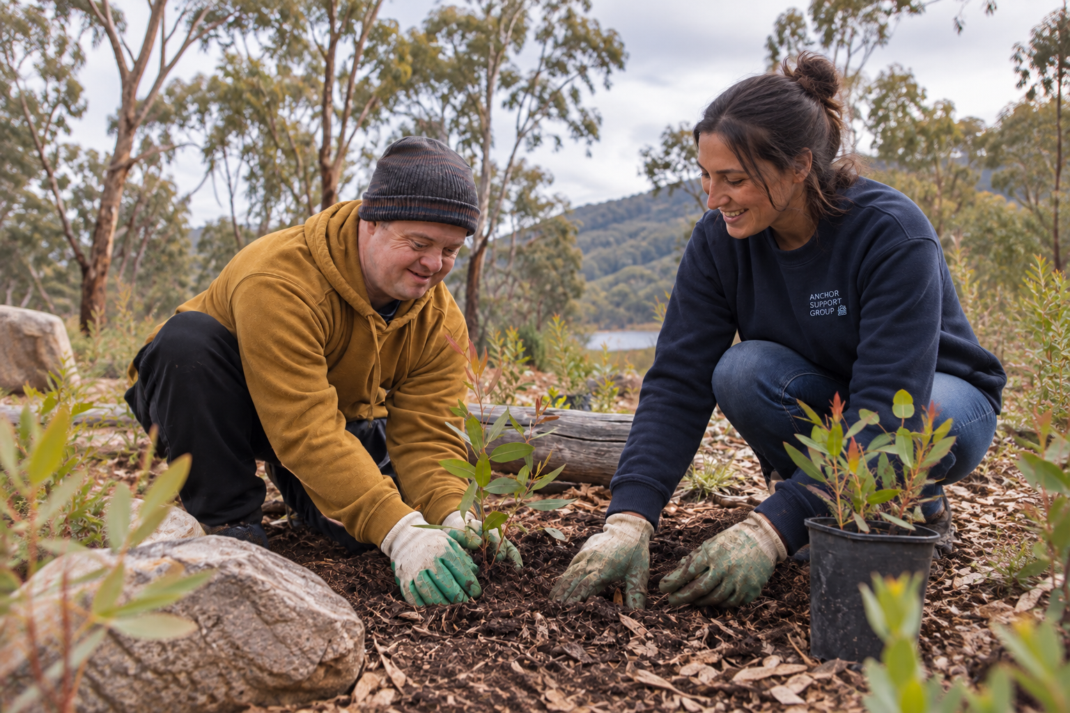 Two people planting together in a garden